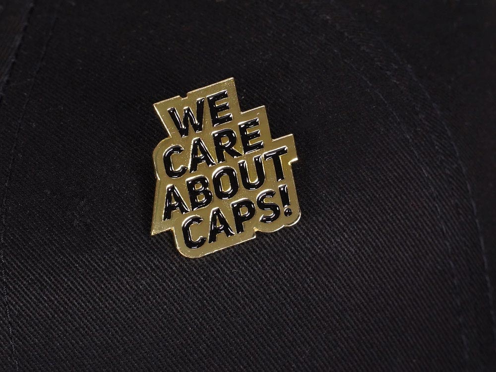 Family Pin We care about Caps! Gold Edition